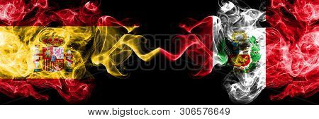 Spain Vs Peru, Peruan Smoky Mystic Flags Placed Side By Side. Thick Colored Silky Smokes Flag Of Spa