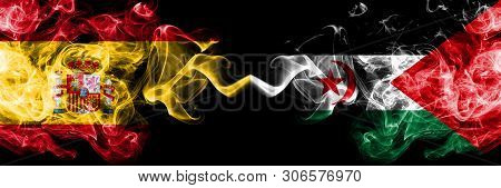 Spain Vs Sahrawi Smoky Mystic Flags Placed Side By Side. Thick Colored Silky Smokes Flag Of Spanish 
