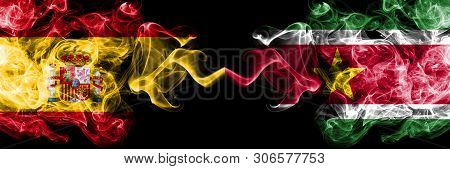 Spain Vs Suriname, Surinamese Smoky Mystic Flags Placed Side By Side. Thick Colored Silky Smokes Fla