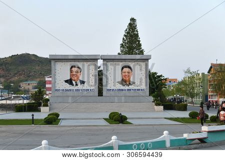 Wonsan, North Korea - May 4, 2019:  Propaganda Banner With Portraits Of Former Leaders In Wonsan, On