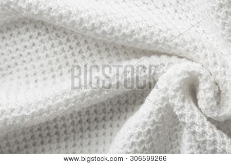Knitted Fabric Background. Draped Tricot Knit From White Pure Organic Cotton Yarn Laid Out In Concen