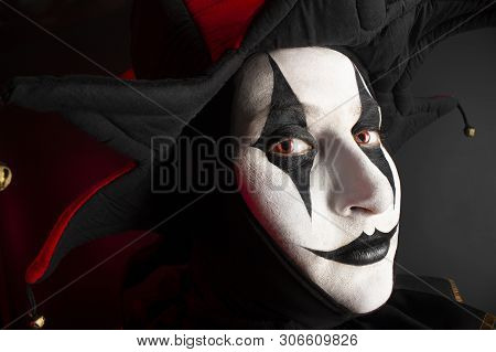 Young Jester Woman's Face, Close-up. Halloween Concept.