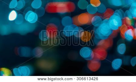 Blurred Abstract Bokeh Background Of City Lights At Night