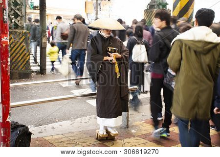 Japanese Monk Standing For Receive Donate From Japanese People And Foreign Travelers Walking Travel 