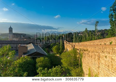 Cityscape, Panoramic View Of Girona, Catalonia, Spain. The Girona Cathedral. View From The City Wall