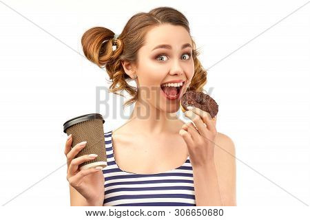 Happy Girl In Striped T-shirt Holding Donut And Drink And Opens Her Mouth To Bite. Funny Cute Expres