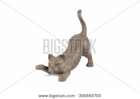 Bronze Figurine Of A Lying Playful Cat With A Raised Paw And Tail Isolated On White Background