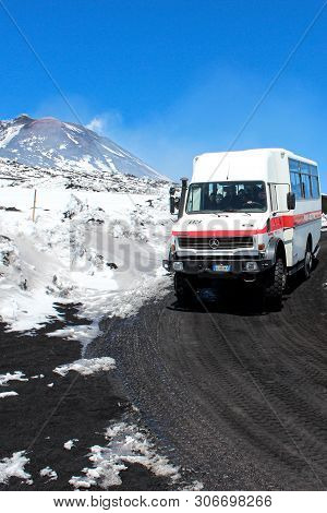 Etna, Sicily, Italy - Apr 9th 2019: Tourist Vehicle Driving People To The Top Of Mount Etna And Back