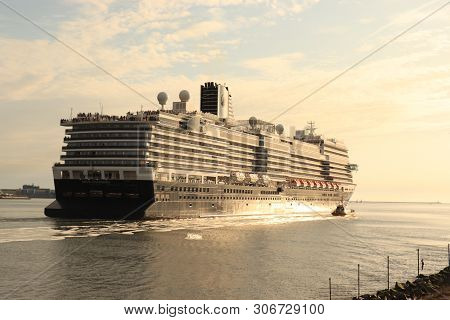 Ijmuiden, The Netherlands -june, 9th 2019: Nieuw Statendam Leaving Ijmuiden Sea Lock, Joined By Pilo