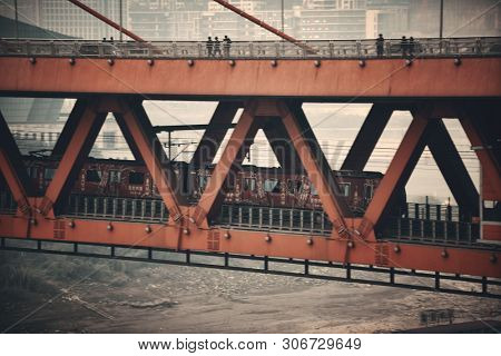 CHONGQING, CHINA â MARCH 13: Train in Dongshuimen Bridge on March 13, 2018 in Chongqing. With 17M population, it is the most populous Chinese municipality.