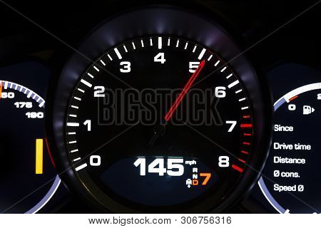 Modern Light Car Mileage (dashboard, Milage) Isolated On A Black Background. New Display Of A Modern