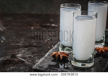 Traditional Arabic Alcohol Drink Raki With Anise, Dark Rusty Background Copy Space