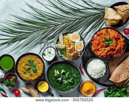 Indian Cuisine Dishes: Tikka Masala, Dal, Paneer, Samosa, Chapati, Chutney, Spices. Indian Food On G