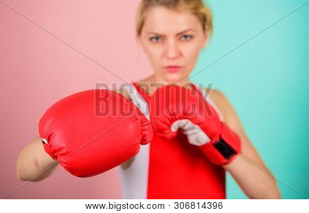 Concentrated On Punch. Woman Boxing Gloves Focused On Attack. Ambitious Girl Fight Boxing Gloves. Fe