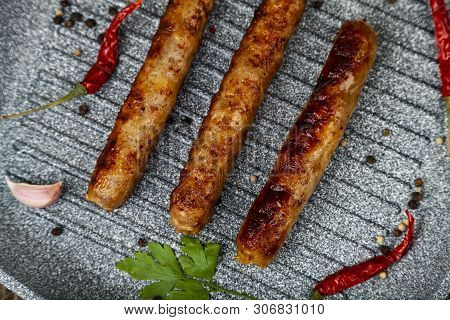 Kupaty In A Frying Pan