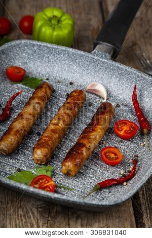 Kupaty In A Frying Pan