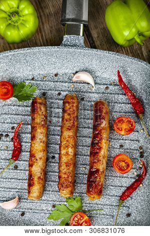 Kupaty In A Frying Pan