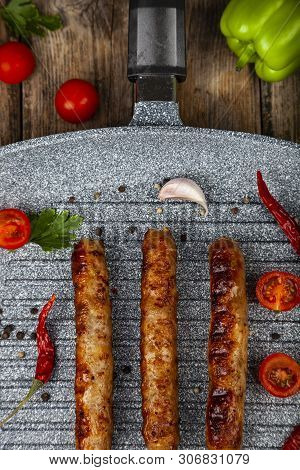 Kupaty In A Frying Pan