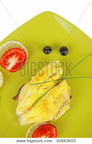 pikantní deska: pečené zlaté seafish filé se zeleninou a citrusy