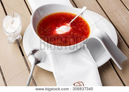 Top View Borscht, Ukrainian Cuisine Sour Soup, With Meat, Potato, Beetroots. Food Background.
