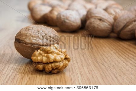 Inshell Walnuts On A Wooden Table. Healthy Food. Healthy Lifestyle.