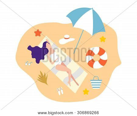 Girl Lying On Beach In A Sweemsuit And A Hat. Girls Relax On The Beach.