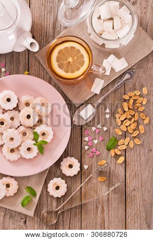 Canestrelli Biscuits With Mint On Wooden Table.