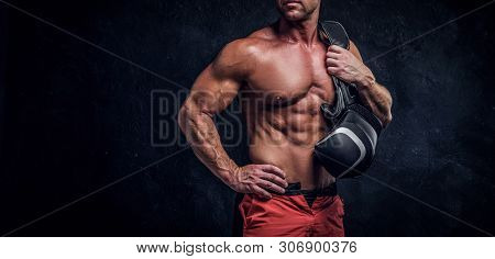 Man With Attractive Muscular Body Is Ready For Fight, Swowing His Spectacular Hits.