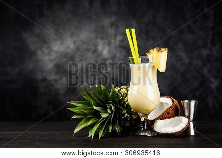 Pina Colada Cocktail on dark background