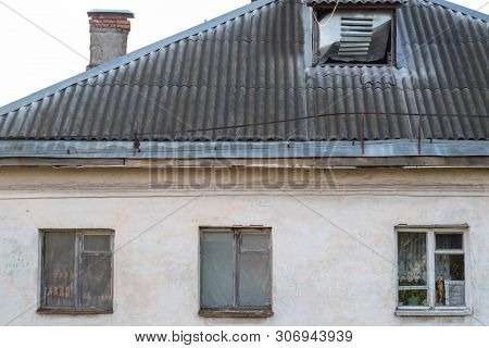 Ribinsk, Russia - June, 9, 2019: windows of an old house in Ribinsk, Russia