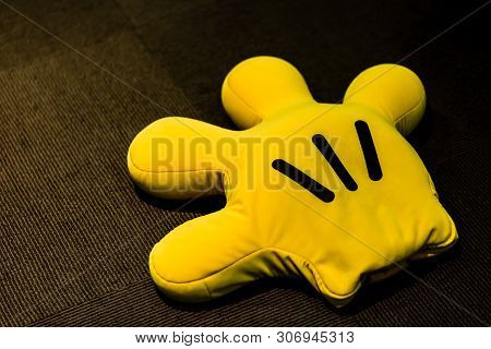 Singapore-20 Aug 2017:yellow Color Disney Mickey Mouse Glove Toy Display Top View