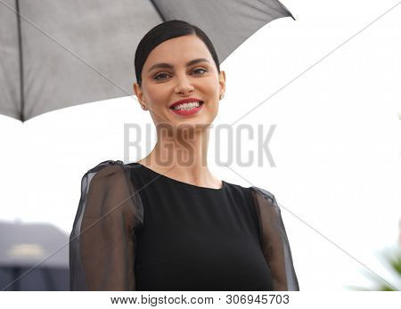 Catrinel Marlon attends the photocall for 