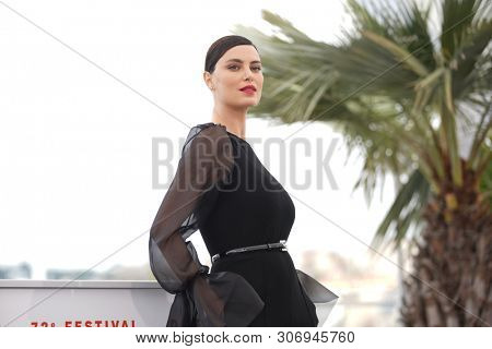 Catrinel Marlon attends the photocall for 
