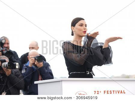 Catrinel Marlon attends the photocall for 