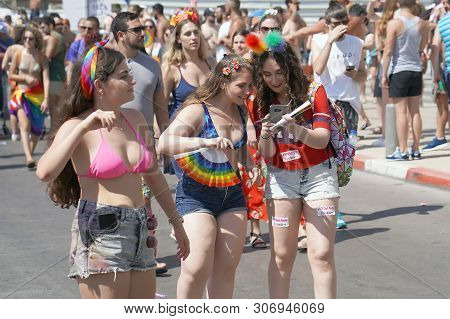 The Annual Parade Lgbt. Girls Lesbians Walking In The Gay Pride Parade. Parade Of Tolerance. Rainbow
