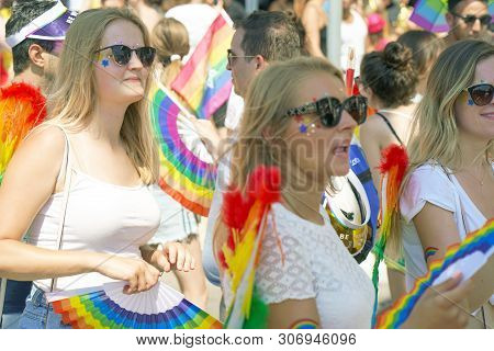 The Annual Parade Lgbt. Girls Lesbians Walking In The Gay Pride Parade. Parade Of Tolerance. Rainbow