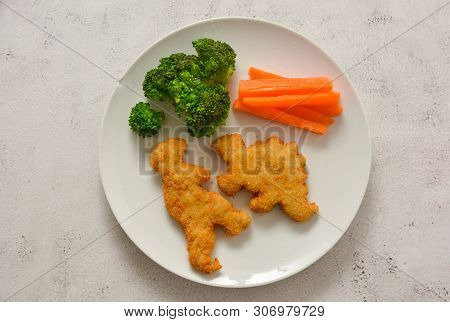 Kids Food. Dinosaur Shaped Chicken, Fish Or Turkey Nuggets, Ready To Eat.