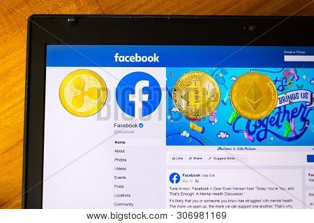 Prague, Czech Republic - June 18 2019: Golden Ripple, Bitcoin And Ethereum Coins Lying On Homepage O