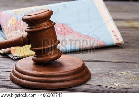 Judges Gavel And Colorful World Map. International Court Concept.