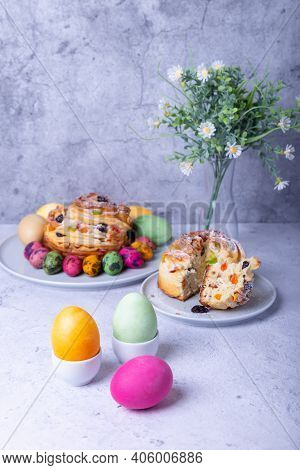 Painted Eggs And Craffin (cruffin) With Raisins, Nuts And Candied Fruits. Easter Bread Kulich. Easte