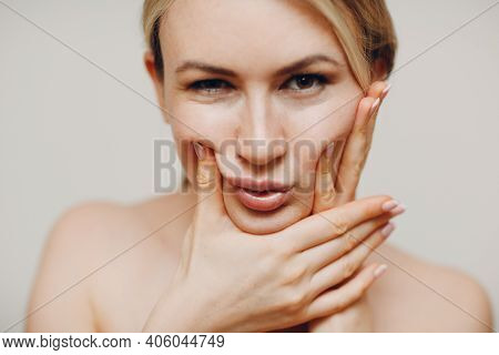 Young Adult Doing Facial Gymnastics Self Massage And Rejuvenating Exercises Face Building For Skin A