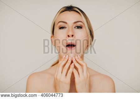 Young Adult Doing Facial Gymnastics Self Massage And Rejuvenating Exercises Face Building For Skin A
