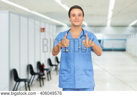 Optimistic Caucasian Male Nurse With Short Hair At Vaccination Station Is Ready For Vacinating Patie