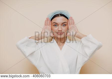 Young Woman Doing Face Building Facial Gymnastics Self Massage And Rejuvenating Exercises