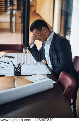 Drafter Suffering From Fatigue In The Workplace