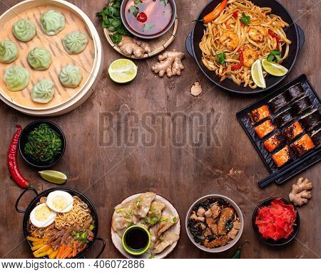 Assorted Of Different Asian Food. Chinese, Japanese And Thai Cuisine. Noodles, Dumplings Gedza, Baoz