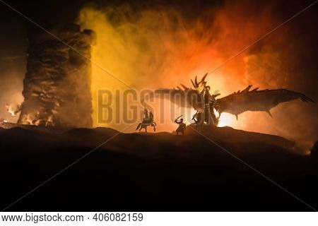 Battle Between Dragon And Heroic Soldiers. Creative Table Decoration. Selective Focus