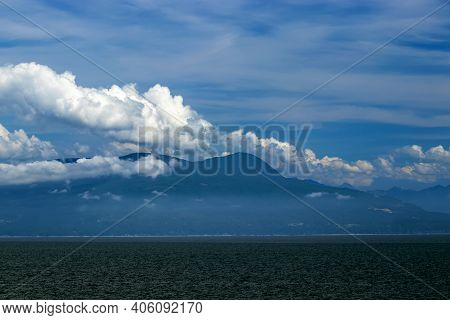 Clouds Reflect Sunshine Over The Pacific Ocean, Bc, Canada. Pacific Ocean Borders Western Canada. Br