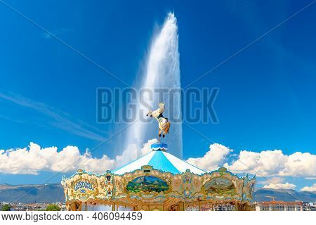 Geneva, Switzerland - Aug 15, 2020: Detail Of The Old Carousel On The Embankment With Jet Deau Fount