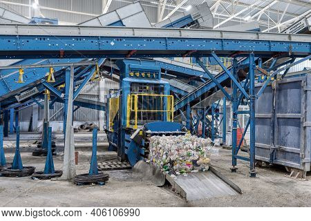 Household Waste Sorting And Recycling Plant. Press For Pressing Plastic Bottles.
